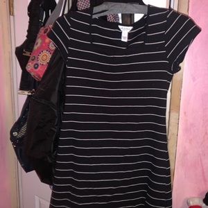 A black and white , kind of flirty dress